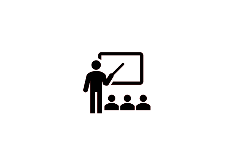Piktogramm eines Lehrers der vor einer Klasse auf eine Tafel zeigt.