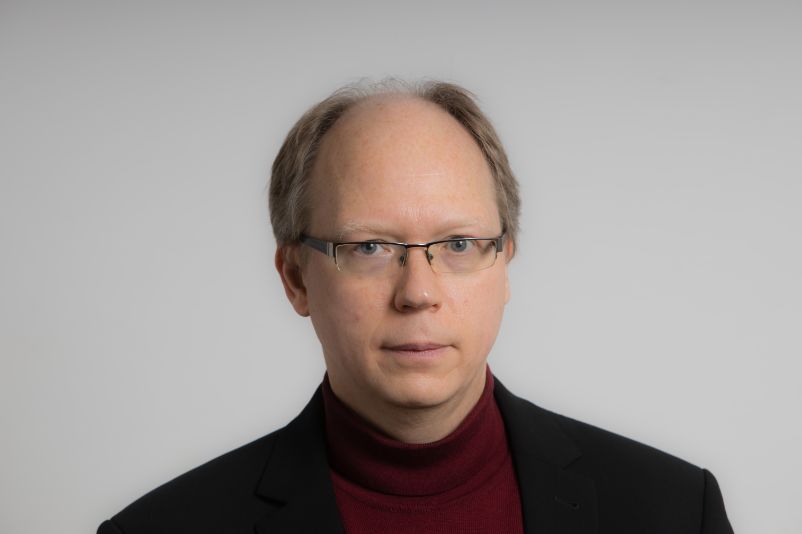 Portraitaufnahme von Dr. Karsten Uhl